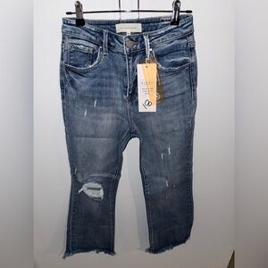 Risen Women’s Distressed Mid-Blue Jeans